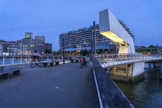 The former Fenix warehouse, left, from 1923, destroyed in the war, renovated in 2019, converted