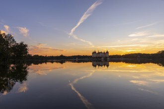 The moated castle, also known as a film set, lies in the middle of a lake and is a popular