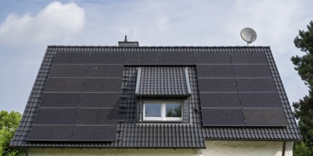 Photovoltaics on the roof of a residential building, Ruhr area, North Rhine-Westphalia, Germany,