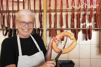 Symbolic image Friendly butcher's shop assistant