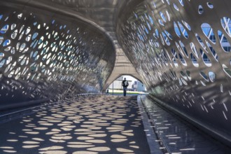 Light effects from the sun in the Parkbruk, a cycle and pedestrian bridge in the city centre of