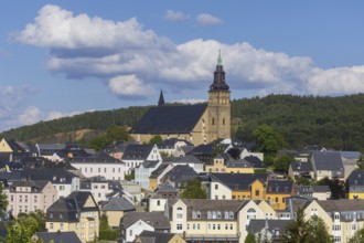 Schneeberg is a town in the Erzgebirge district of Saxony. High above the town, the town church of