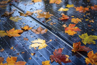 Colorful autumn leaves and rain on photovoltaics solar panel. Generative Ai, AI generated