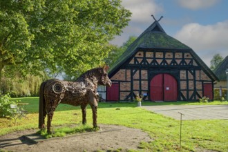 Art project Iron Valentina by Max Barske and farmhouse Strassen, open-air museum Klockenhagen,