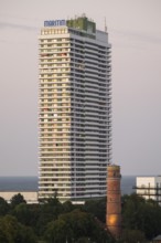 Old lighthouse, Hotel Maritim, skyscraper and landmark of the Baltic Sea spa Travemünde, Bay of