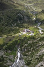 View of mountain hut Berliner Hütte with Zemmbach stream in the Zemmgrund valley, Berliner