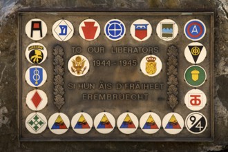 Liberation memorial with the inscription Unseren Befreiern 1944 - 1945 with coats of arms of