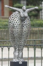 Sculpture Plongeon, head jump, by Laurent Maëro, Maero, metal grid, metal, grey, holes, bridge, La