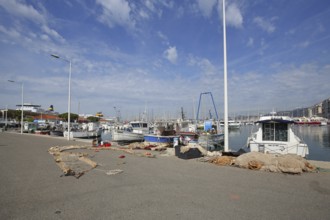 Fishing boats with fishing nets and accessories at the quay, cutter, boats, seafaring, harbour,