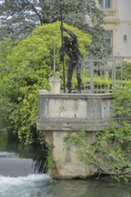 Sculpture Quo Vadis by Raphael Thierry standing on the river La Sorgue, man, raftsman with pole,