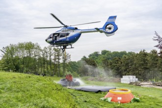 Forest fire fighting exercise of the Essen fire brigade, the water supply was rehearsed over longer