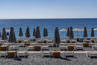 Beach, empty, organised, with sun loungers and parasols, catering, bay at Koutsounari Beach, on the