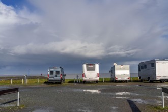 Motorhome parking space on the North Sea coast, directly on the coast, at Neuharlingersiel harbour,