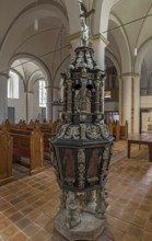 Richly carved late Renaissance baptismal font, case from 1653, St Mary's Church, Brick Gothic,