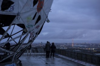 View of the city of Berlin with radio tower and television tower next to a radar dome on the former