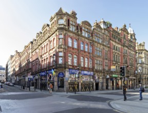 Historic brick building at a busy crossroads in the city, Liverpool