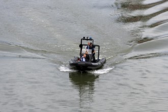 Police operation on a rubber dinghy on the Neckar, Stuttgart, Baden-Württemberg, Germany, Europe