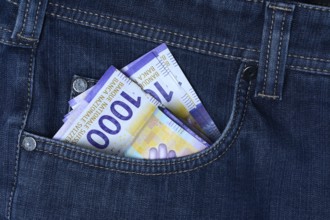 Banknotes in trouser pocket, Swiss franc, Switzerland, Europe