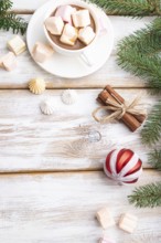 Christmas or New Year frame composition. Decorations, box, balls, cinnamon, ribbons, fir and spruce