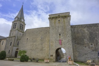 Church tower and fortification wall with Tor tor, La Cavalerie, Aveyron, France, Europe