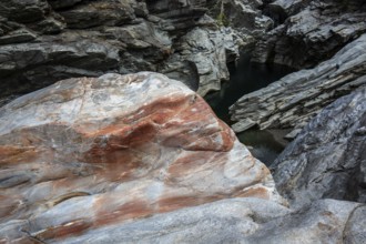 Rocks, granite rock formations in the Maggia River near Ponte Brolla, in the Maggia Valley, Valle