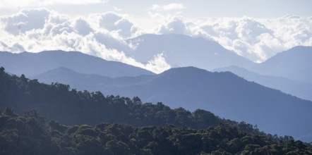 View of hills with cloud forest, Dramatic clouds between the mountains, Province of San José, Costa