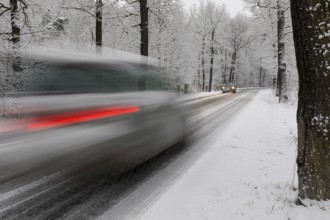 Winter road conditions with snow and icy conditions, here in Spitzgrund near Coswig, where there