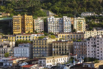 High angle view of apartment and condominium buidings plus mountainside, Salerno, Campania region,