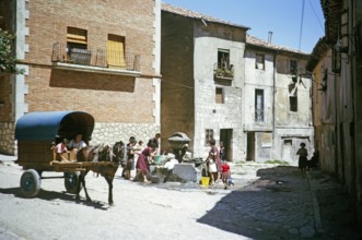 People fetching water from a well in a village in northern Spain in 1964