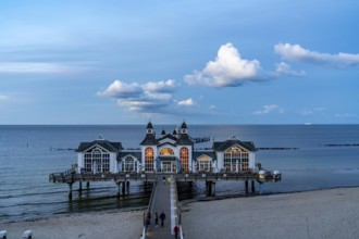 The pier of Sellin, evening mood, sunset, 394 metres long, with restaurant, jetty, beach chairs,