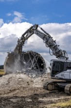 Demolished tower of a 20 year old wind turbine, in the Werl wind farm, 5 old Enercon E-66 turbines