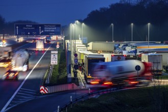 Heavy traffic on the A2 at the Schwarze Heide rest area, Bottrop, overcrowded car park for trucks