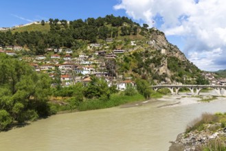 View including Berat Castle and Ottoman period Gorica bridge crossing River Osum, Berat, Albania,