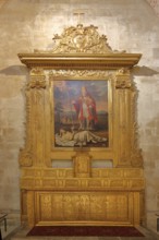 Painting with golden frame of Bishop Saint Martin Ormeaux, Bishop healing plague sufferers,