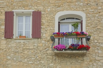 Window with balcony and flower decoration, shutters, balcony railing, two, idyll, house wall,