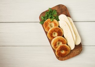 Mchadi, corn tortillas, traditional Georgian dish, corn bread, with Imeretian cheese, homemade, no