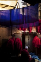 Wool for drying in the dyer's souk, dyer, colours, red, blue, complementary, contrast, colour