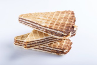 Waffle sandwiches with boiled condensed milk isolated on white background. closeup