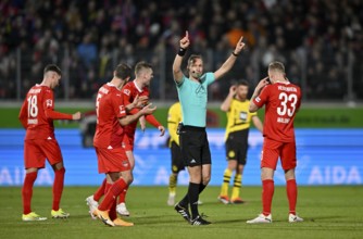 Referee Bastian Dankert indicates VAR, video assistant referee, video evidence, video referee,