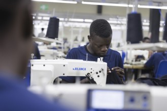 BENIN TEXTILE CORPORATION BENIN, Seamstress in a textile factory in Benin, Glo-Djigbe, 07/03/2024