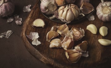 Fresh garlic, on a dark background, top view, food concept