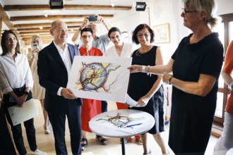 Federal Chancellor Olaf Scholz, (SPD), photographed during a visit to the Alte Dampfbaeckerei in