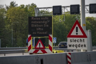 German-Dutch border at Emmerich-Elten, A3 motorway, signal board asks travellers to only make