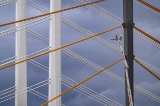 The new Rhine bridge Neuenkamp, the A40, white pillar ropes, and the old motorway bridge, which is