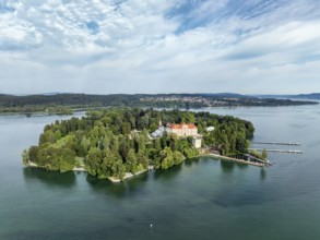 The island of Mainau in Lake Constance with the jetty and the baroque Mainau Castle, built between