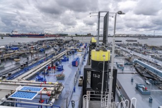 Inland tankers waiting for new cargo, in the petroleum harbour, seaport of Rotterdam, Maasvlakte,