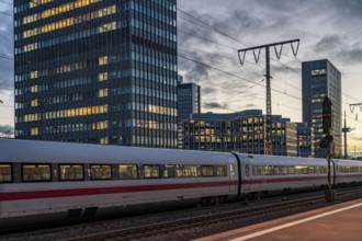 Railway station, ICE train on platform, skyline of Essen city centre, North Rhine-Westphalia,