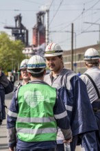 Steelworkers at a demonstration in front of the headquarters of ThyssenKrupp Steel Europe in