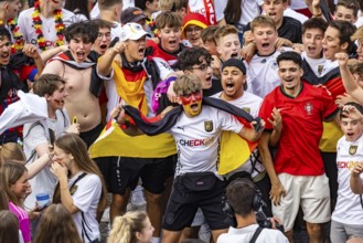 UEFA European Football Championship. Enthusiastic fans at the public viewing in the host city of