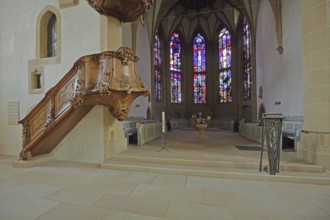 Pulpit with wood carving and chancel, interior view, colourful, church windows, arts and crafts,